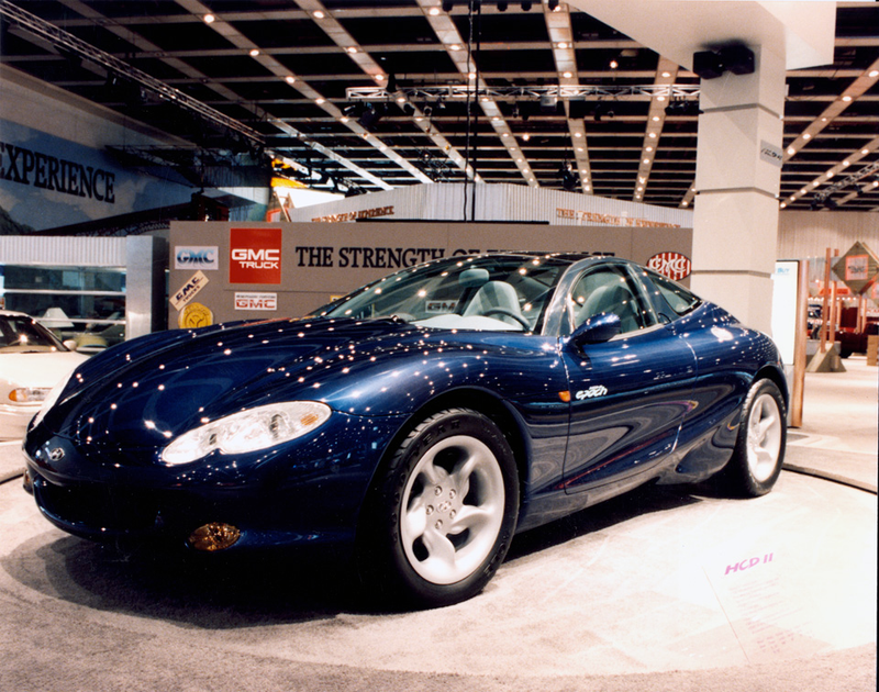 Illustration for article titled This Is How Ridiculous The Detroit Auto Show Will Look In 25 Years